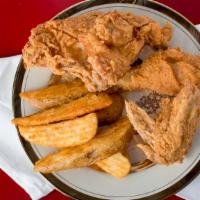 12 Piece Chicken Special · Includes five legs, four wings, and three thighs.