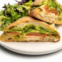 Chicken Pesto · Grilled chicken, fresh mozzarella, roasted plum tomatoes and arugula pesto on ciabatta..