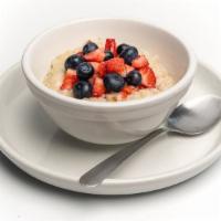 Old Fashioned Oatmeal · Warm and hearty McCain steel-cut Irish oats made with skim milk.