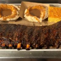 Full Rack Ribs · St. Louis Ribs, Dry Rubbed and Slow Smoked, Lightly Glazed with Our Original BBQ Sauce. Incl...