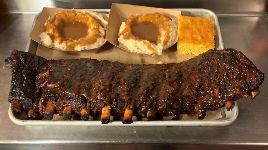 Full Rack Ribs · St. Louis Ribs, Dry Rubbed and Slow Smoked, Lightly Glazed with Our Original BBQ Sauce. Includes Two Homemade Sides and Cornbread. GF