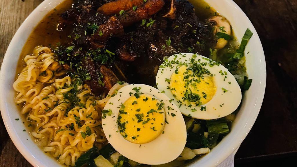 Ramen Bowl (Oxtails) · Ramen noodles, vegetables in broth (may contain mushrooms) and  topped with oxtails and a boiled egg