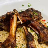 Rack Of Lamb Fried Rice. · Fried rice cooked with vegetable and topped with rack of lamb