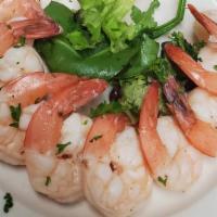 Garlic Shrimp · Cooked in white wine and garlic sauce.