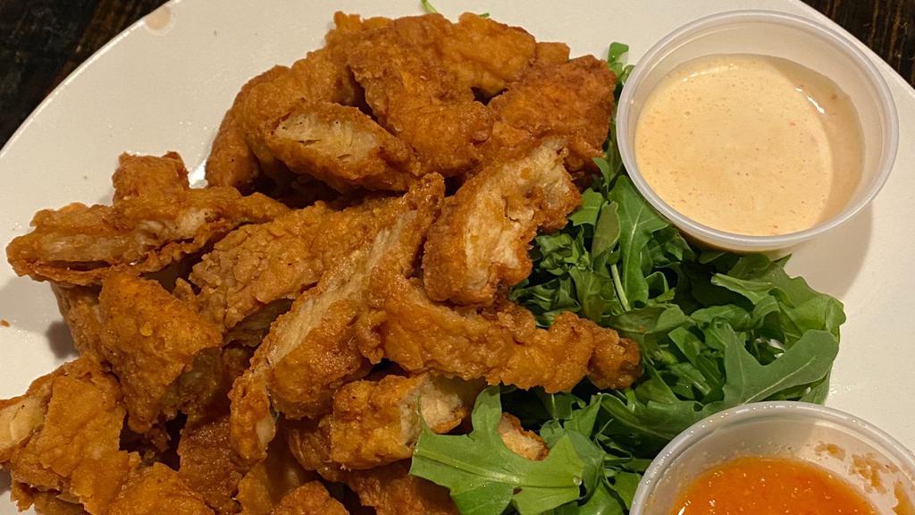 Chicken Tenders · Cut into bite sized pieces and served with  honey mustard sauce.