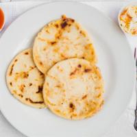 Pupusas De Harina De Arroz · Options: 
	Queso - Cheese
	Frijol – Black beans
	Chicharrón - Pork
	Mixed - Mezclado
	A...