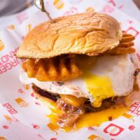 Brunch Love · Sunny side up egg, cheddar cheese, Waffle fries, bacon mayo.