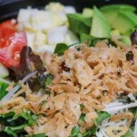 Chopped Salad · Spring mix, Cabbage, Tomato, Crispy Onions, Avocado, Cucumber, Hard Boiled Egg, Choice of Dr...