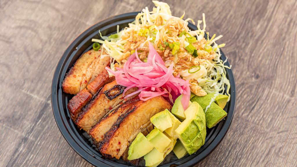 Pork Belly Bowl · Rice bowl with Braised pork belly, sesame citrus slaw, crispy onions, pickled carrot, and avocado