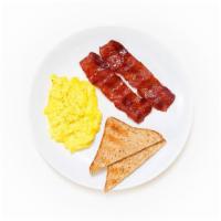 Farm Eggs · Two farm eggs scrambled and served with whole wheat toast and two strips of crispy turkey ba...