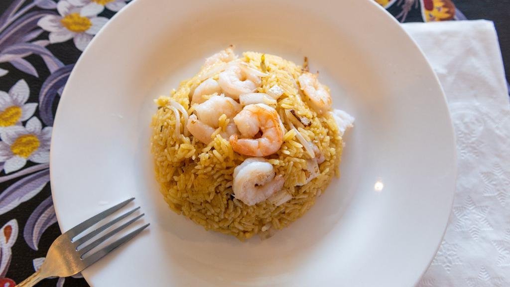 Gf Shrimp Fried Rice · Jumbo shrimp stir fried with steamed rice, peas, carrots, white onions, green onions, egg and bean sprouts with gluten-free soy sauce.