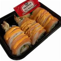 Paradise Roll		 · Shrimp tempura, cucumber, topped with seared salmon, spicy crab, Tanoshi special sauce