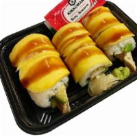 Golden Dragon Roll · Mango on top of maki roll with shrimp tempura, avocado, cucumber