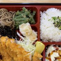 Chicken Katsu Bento チキンカツ弁当 · Main dish served with miso soup, house salad, rice and side dishes.