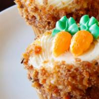 Carrot Cupcakes · Our delicious cake made with carrots, walnuts, and pineapple with cream cheese icing.