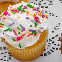 Vanilla Cupcake With Vanilla Buttercream Icing With Seasonal Sprinkle · 