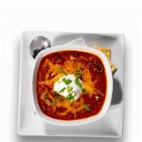 Hearty Chili · Mild chili with beans, served with cheddar cheese, sour cream and scallions