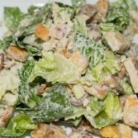 Caesar Salad · Romaine lettuce, Parmigiano cheese, croutons and choice of chicken.