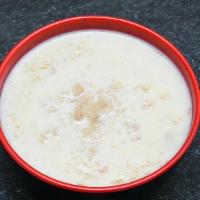 Kheer · Rice pudding. Basmati rice cooked with milk and pistachios.