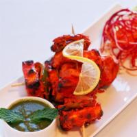 Paneer Tikka · Choice of protein grilled in tandoor with aromatic spices.