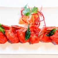 Shrimp Tikka · Shrimps, yogurt, spices and cooked in tandoor.