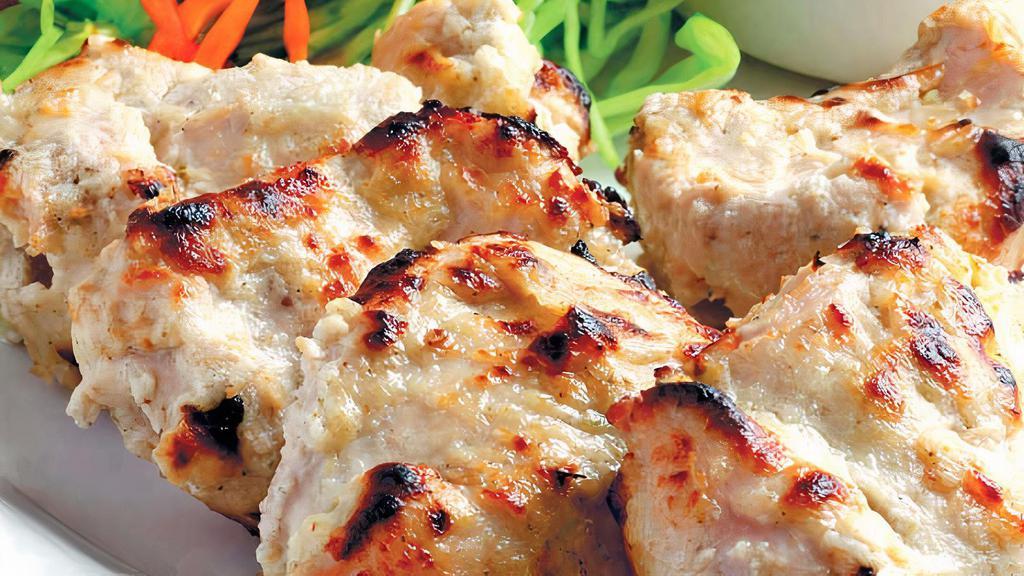 Chicken Malai Kabab · Tender cubs of Chicken marinated in special yogurt based malai sauce and grilled in Tandoor