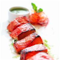 Chicken Tikka Kabab · Tender cubs of Chicken marinated in special tikka sauce and grilled in Tandoor