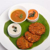 Masala Vada (Veg) · Crispy roundels with lentil, seasoned with herbs and fresh curry leaves. Served with chutney.