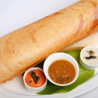 Paper Ghee Roast · Thin lengthy rice & lentil crepe served with coconut chutney and sambar.