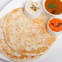 Kal Dosa · One piece of spongy crepe, served with sambar and chutney.