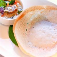 Appam · Appam is crispy edged cup-shaped pancakes made of a fermented rice batter. Popular in southe...