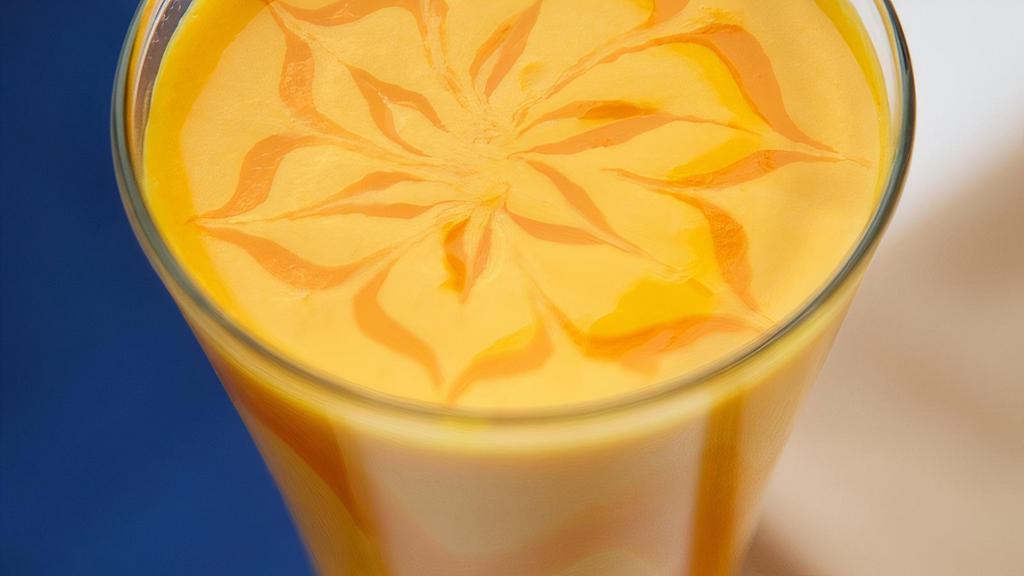 Mango Lassi · Refreshing drink with mangos and homemade yogurt.