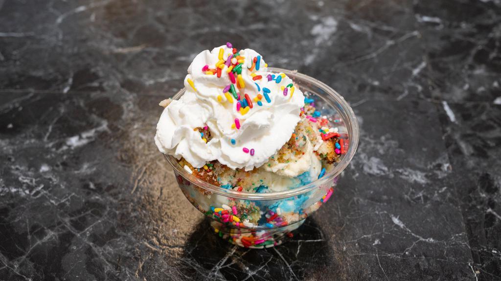 Its My Party · Scoops of vanilla and I Scream for cake ice cream with warm Funafuti cake pieces Topped with a layer of cake frosting, whipped cream and rainbow sprinkles.
