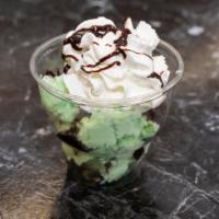 Mint Fudge · Mint Chocolate Chip Ice Cream with hot fudge, Oreos and whipped cream.