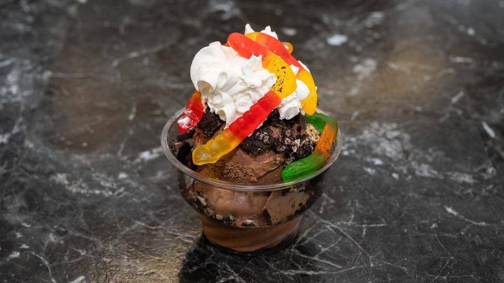 Arctic Dirt & Worms · Chocolate Ice Cream with crushed Oreo, whipped cream and gummy worms.