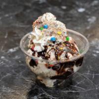 Little Fishes · Fly fish fudge Ice Cream with m&ms and chocolate sauce and whipped cream.