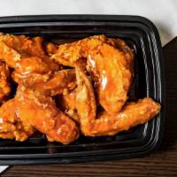 Chicken Wings With Dc. Mumbo Sauce · Hot and spicy.