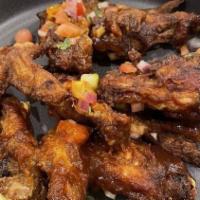 Voodoo Chicken Wings With Bourbon Bbq Sauce · Mild. Jay's voodoo spice mix , Jay's bourbon BBQ sauce, tomato-cucumber salad. Dairy-free / ...
