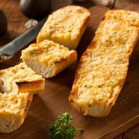 Garlic Bread  · Buttery bread that is topped with garlic.