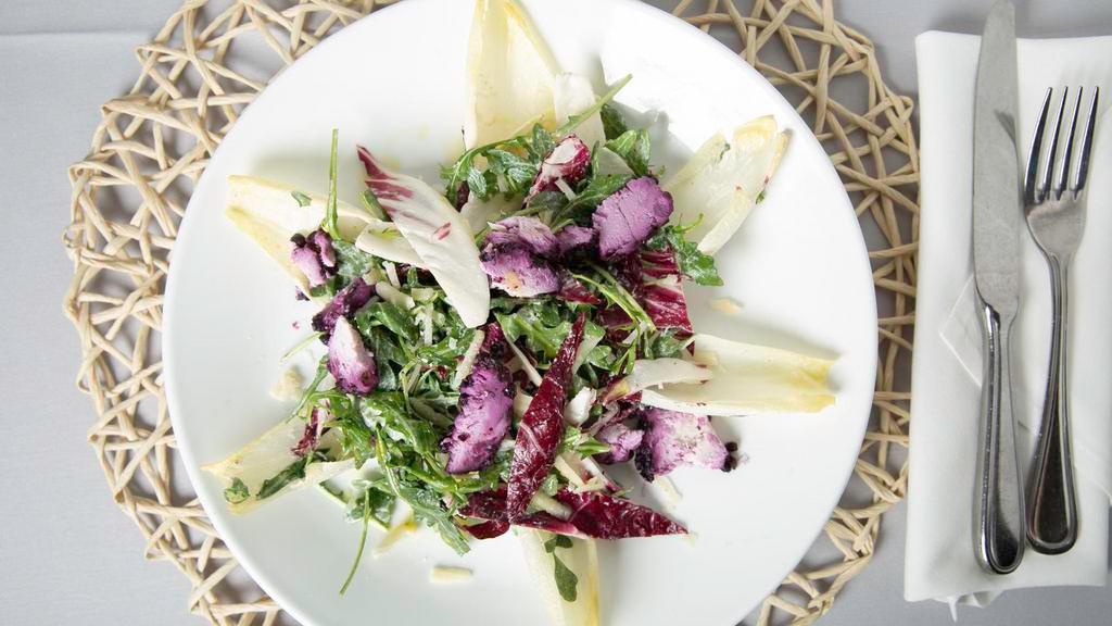 Arugula · Roasted beets, pickled red onions, goat cheese, toasted almonds,  tossed in a berry vinaigrette.
