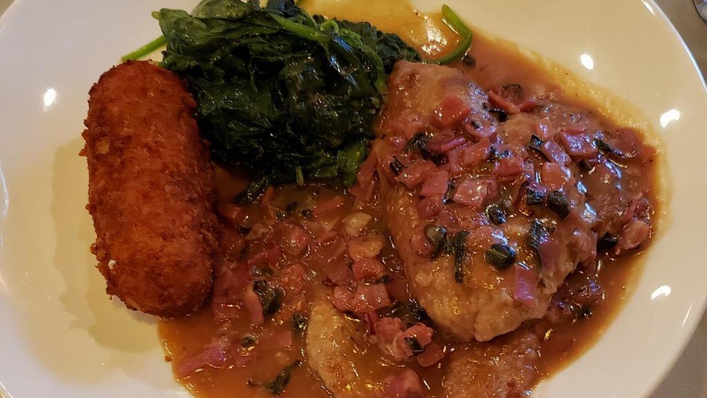Veal Saltimboca · Top round veal scaloppini served in a prosciutto, sage, white wine demi,  over wilted greens and potato croquette.