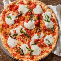 Margarita Pizza · Comes with fresh mozzarella, basil and olive oil.