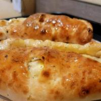 Calzone - Cheese, Toppings And More!! · Choose our Plain Cheese Calzone, a blend of 3 different cheese:  Or add a topping (or 2!!)