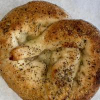 Cheese Pretzel · Hand made crispy cheese pretzel, sent with a dipping sauce