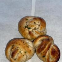 Garlic Knots  · Our garlic knots are one of our best sellers!!  Fresh baked dough rolled in fresh garlic, pa...
