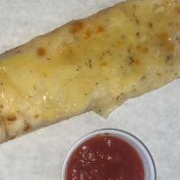 Cheesy Bread & Dip · Double  layer of cheese & crust.  Includes dipping sauce