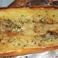 Garlic Bread  · Bread, topped with garlic & olive oil, herb seasoning, baked to perfection. Melts in your mo...