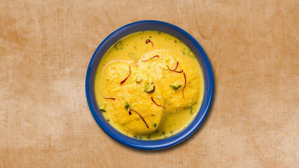 Supreme Rasmalai · Cottage Cheese ball soaked in creamy water enrich with saffron