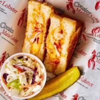Lobster Grilled Cheese · Maine lobster, pepper jack & cheddar cheeses, on Texas style toast