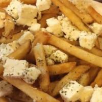 Greek Fries · Deep fried potatoes with seasoned feta cheese and oregano.